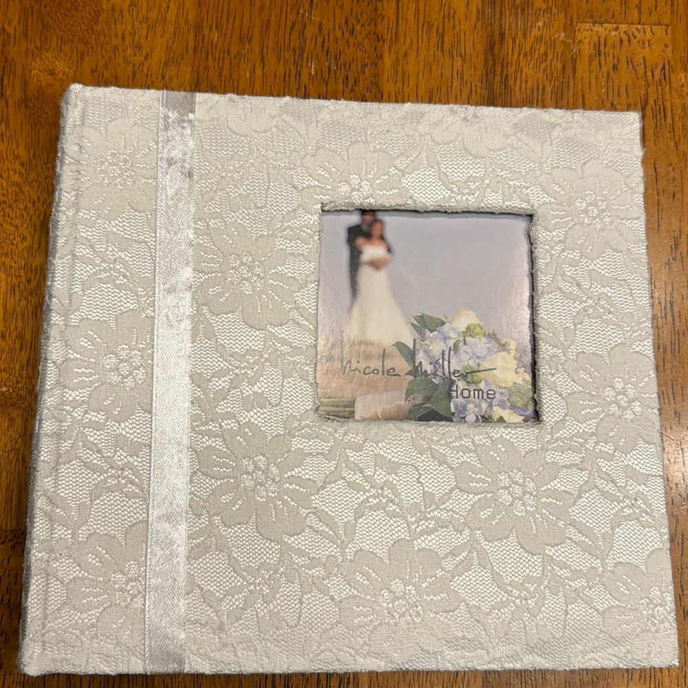 Nicole Miller Home photo album. 9” X 10” (164 -4X6) pics.